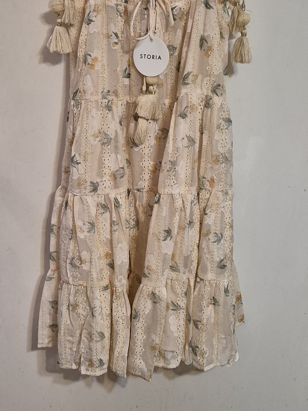 Storia Cream Tiered Eyelet Floral Tassel Dress